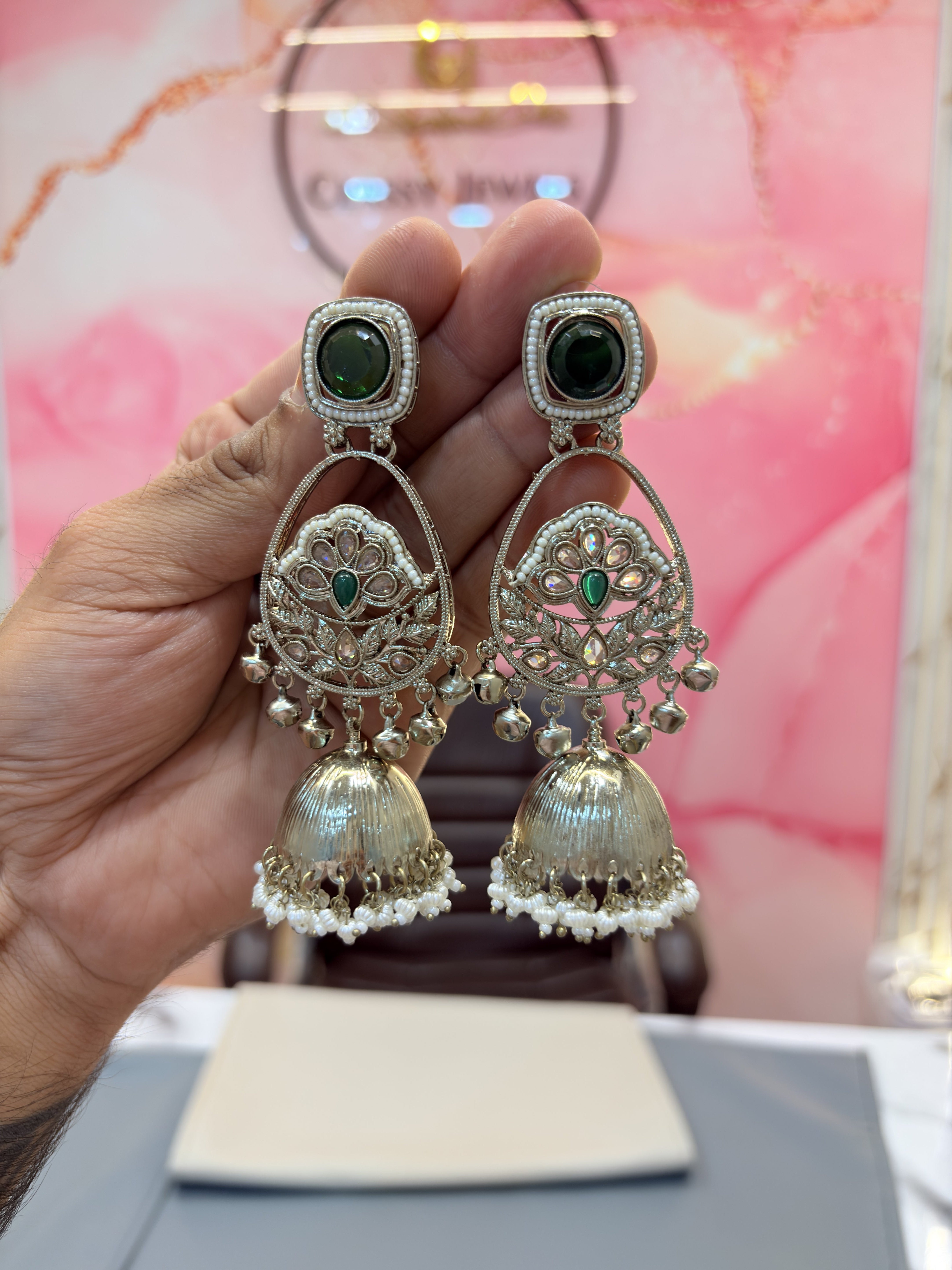 Intricate Jhumka Earrings with Stone and Pearl Detailing