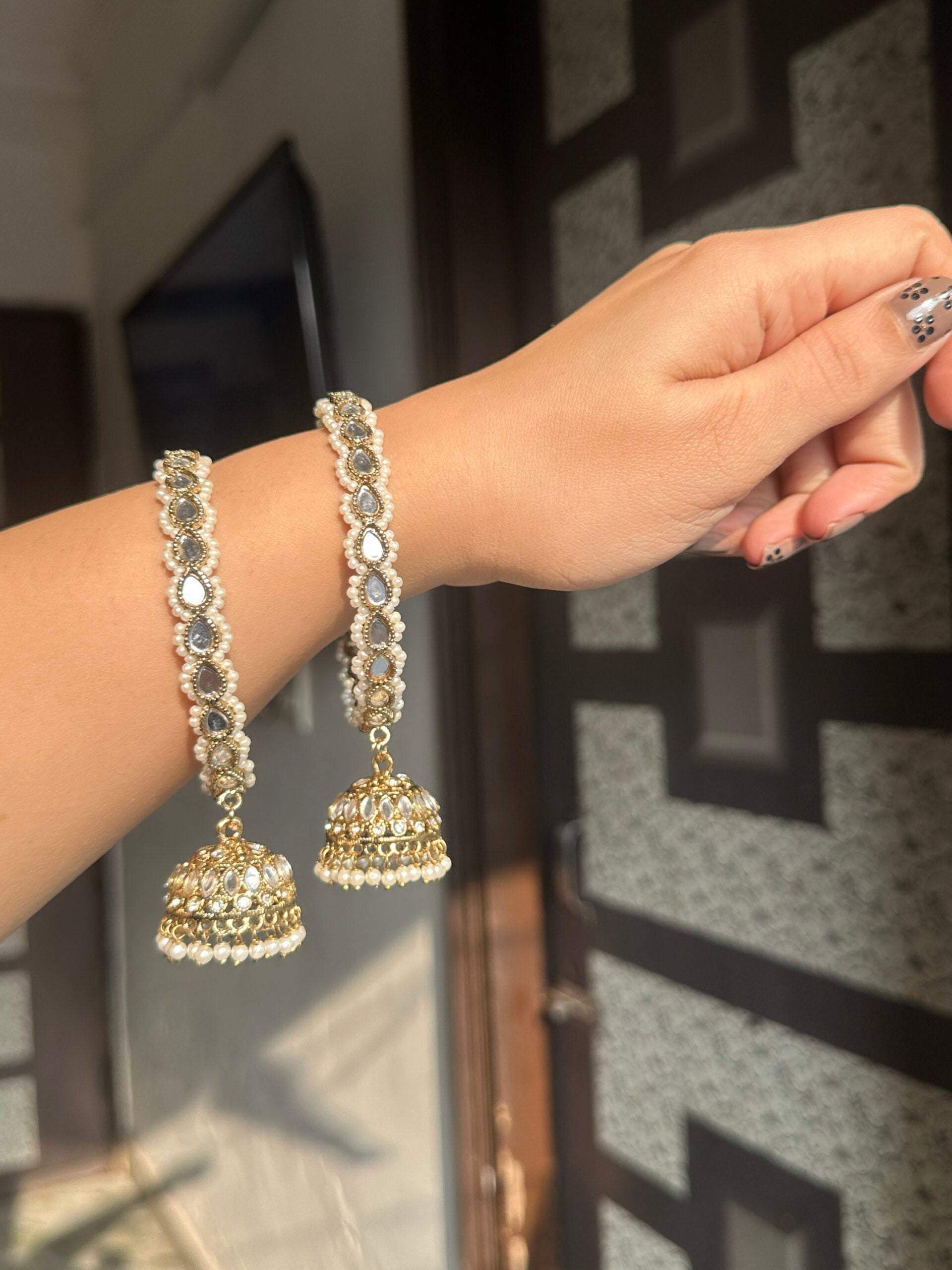 Golden jhumka bangles image 0