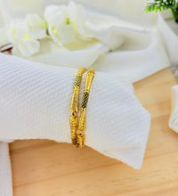 Golden aura bangles image 1