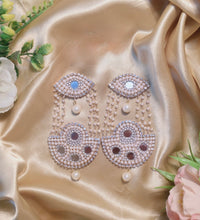 Beaded eye earring image 0