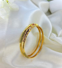Golden aura bangles image 0