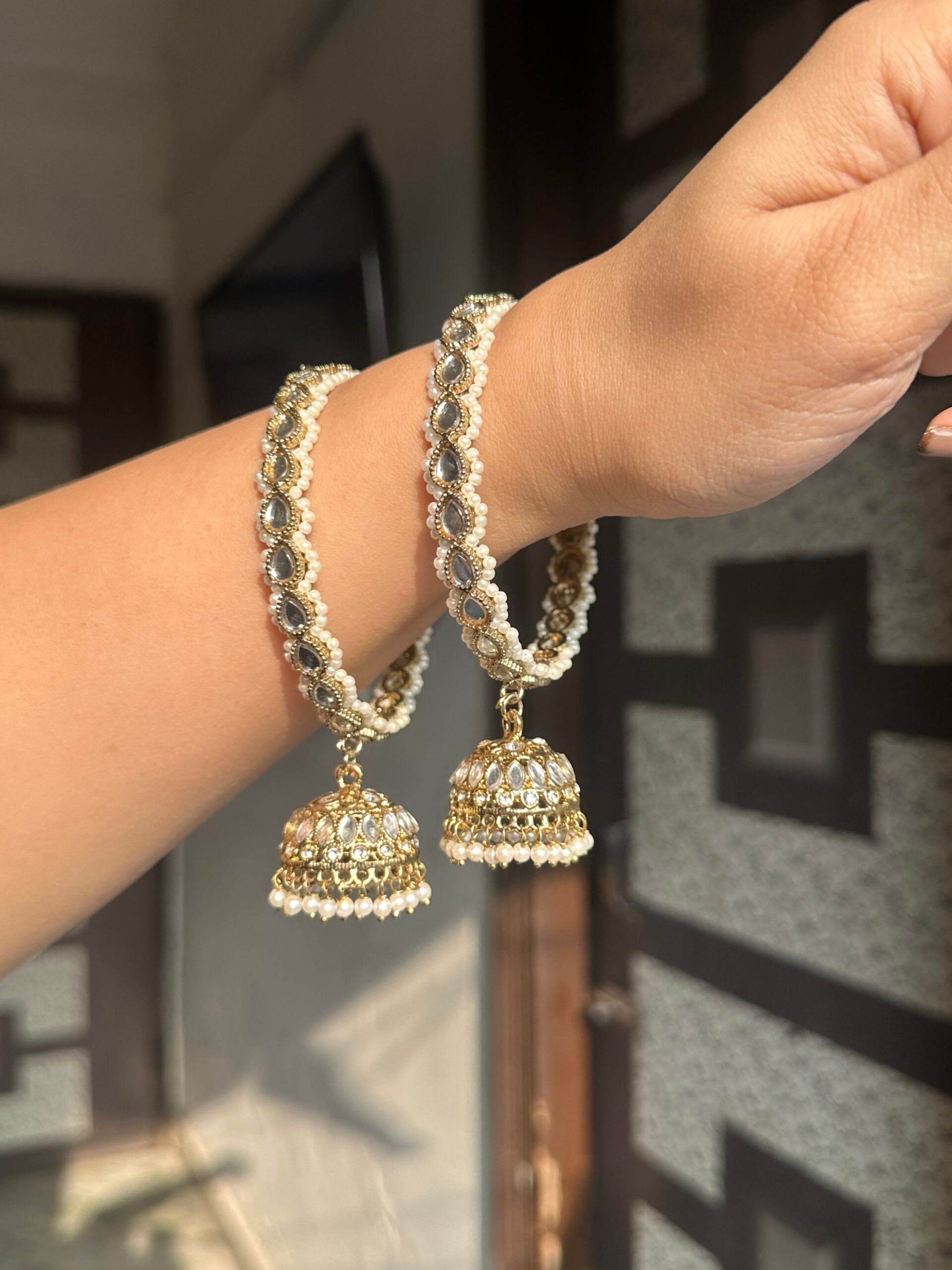 Golden jhumka bangles image 1