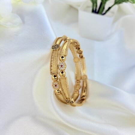 Everglow brass bangles